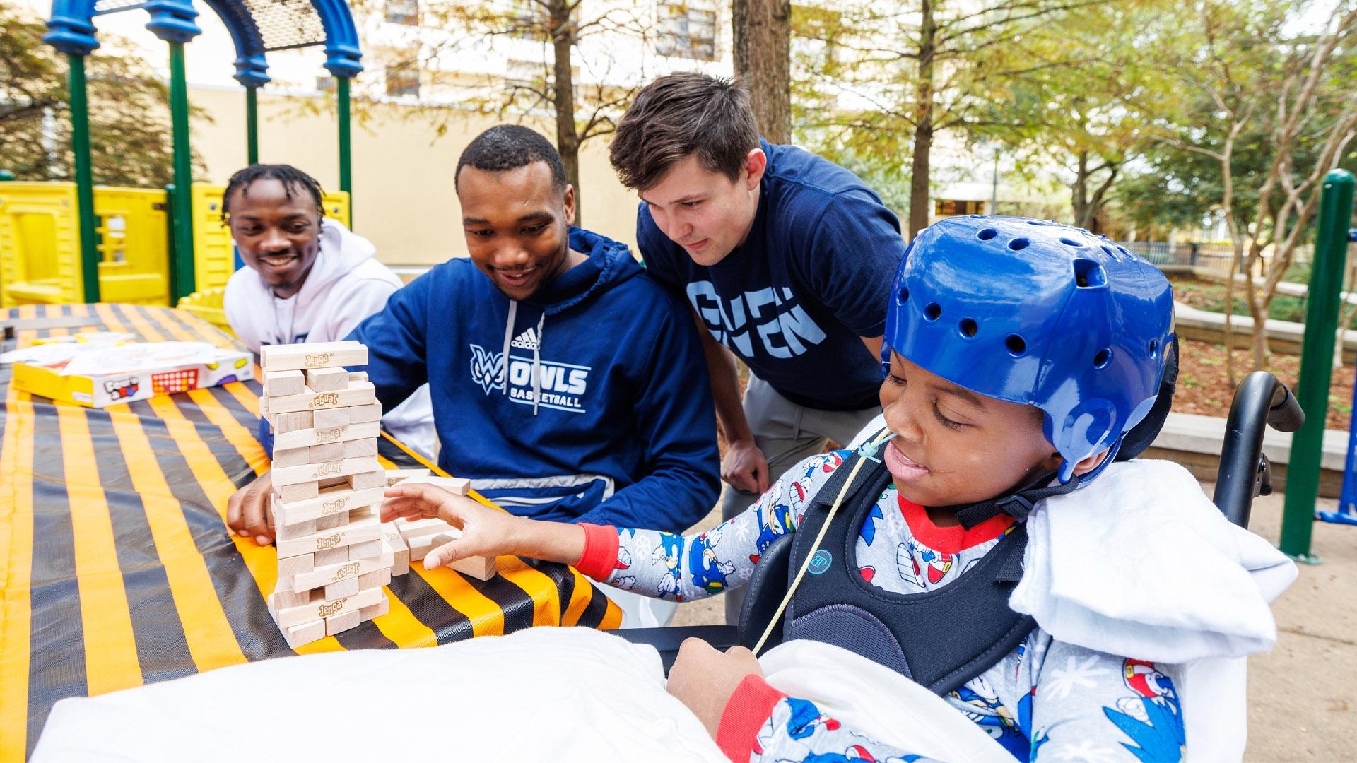 MUW men's basketball community outreach