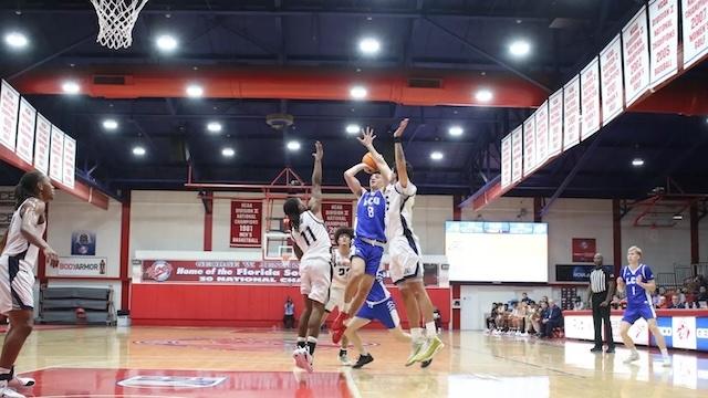 Lubbock Christian drives to the hoop at the Small College Basketball Hall of Fame Classic. 